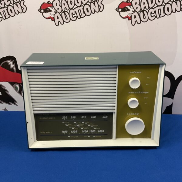 Vintage HMV model 1380 valve radio with wooden cabinet.