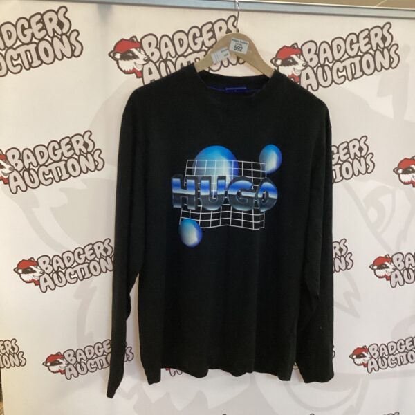 Hugo Boss size S jumper with a bold colour block design.