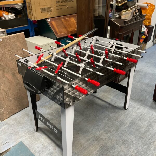 Hy Pro multi games table with table football and snooker features.