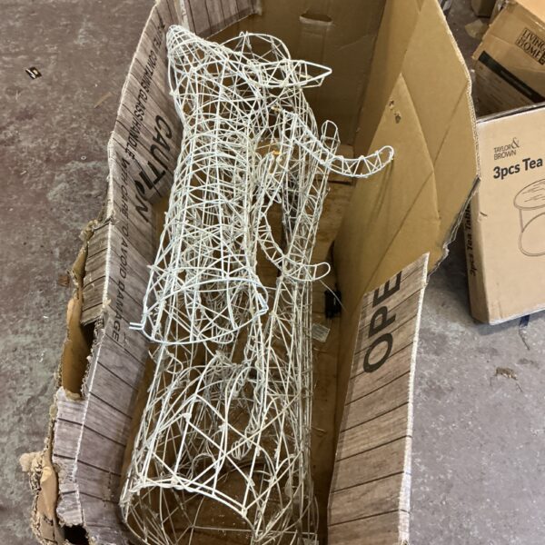 Wireframe illuminated Christmas reindeer decoration for festive lighting.