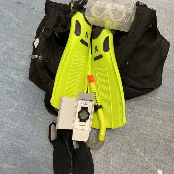 Beaver Hold-all with scuba diving gear flippers snorkel goggles and a suunto mosquito divers digital wristwatch