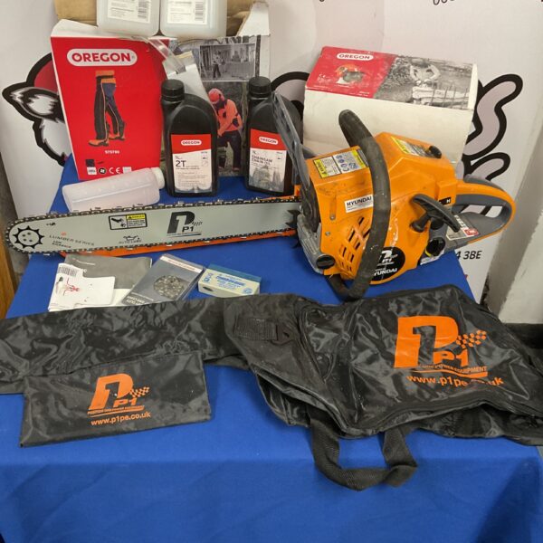 Hyundai petrol chainsaw with Oregon trousers & helmet chainsaw cover and accessories bought new but never used