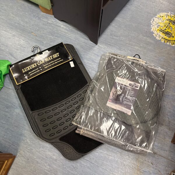 Set of new luxury car mats with set of front seat covers