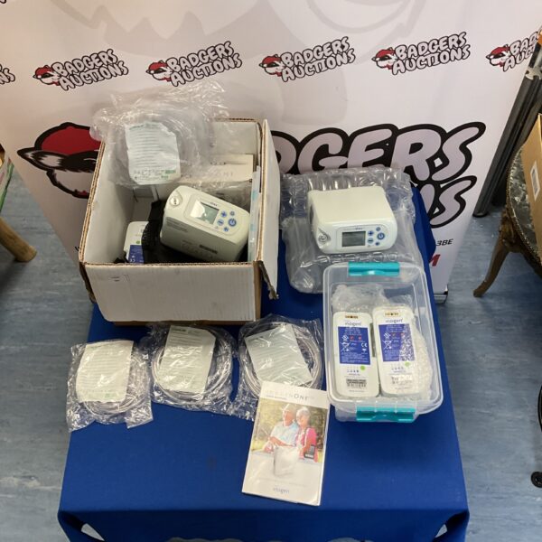 Inogen One G5 oxygen concentrator machine with accessories.