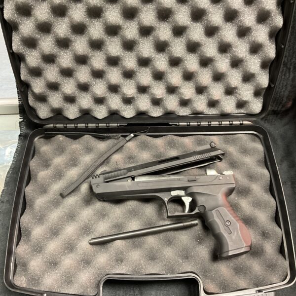 Open Flambeau case displaying interchangeable barrel pistol set.