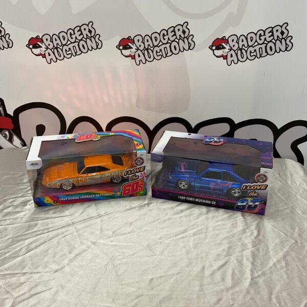 Jada 60s diecast cars, 1969 Dodge Charger Daytona and 1989 Ford Mustang GT.
