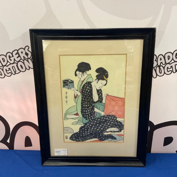 Framed vintage Japanese print of geisha girls.