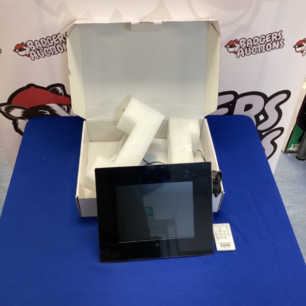 Black Jessup digital photo frame with remote control included.