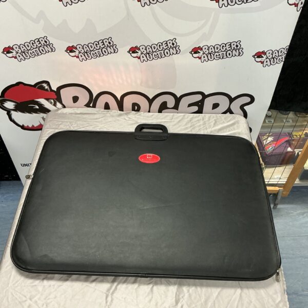 Jumbo puzzle board with felt surface and carrying handle.
