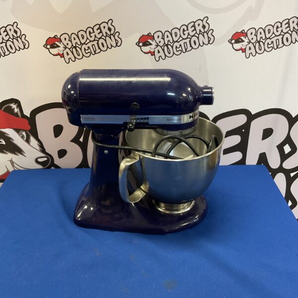 Blue KitchenAid Artisan stand mixer, a classic kitchen appliance.