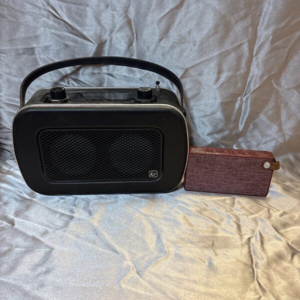 Compact KitSound Drive portable radio with retro design.