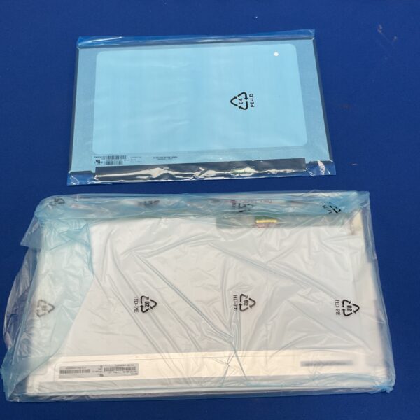 New laptop LCD screen panel in protective packaging.