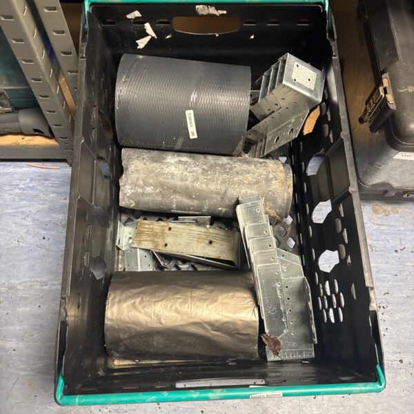 Lot of lead flashing, membrane and joist brackets for construction.