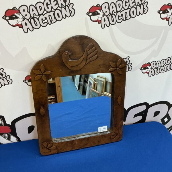 Vintage leather framed mirror for wall decoration.