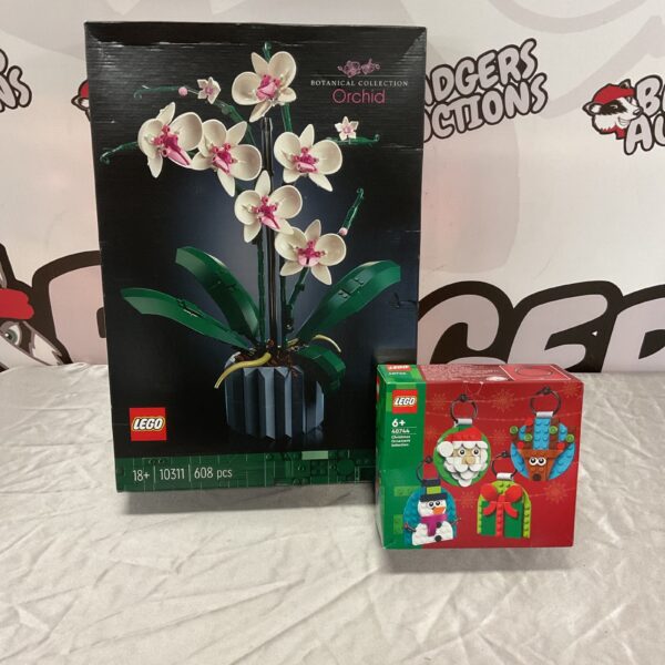 Lego orchid set and Christmas ornaments for festive display.
