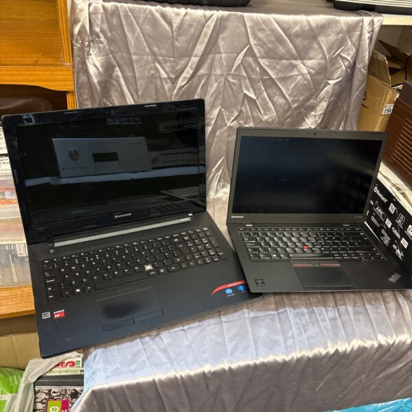 Lenovo ThinkPad X1 Carbon laptop for repair, showing the keyboard and screen.