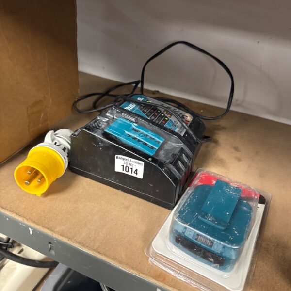 Used Makita 110v battery charger for power tools.