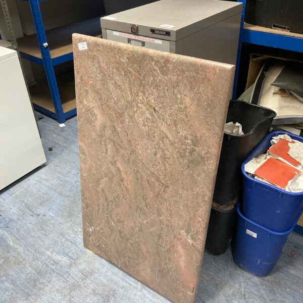 Grey and cream marble worktop for kitchen renovation.