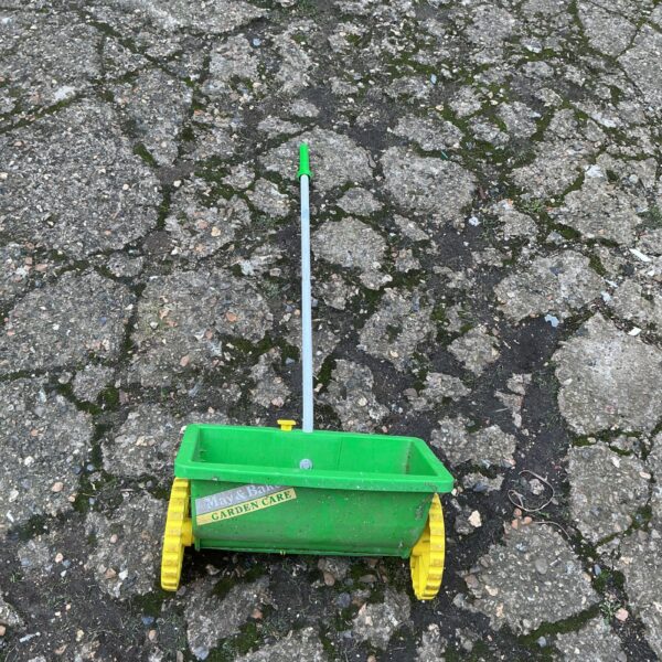 Vintage May and Baker garden seeder in used condition.