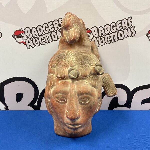 Terracotta bust of Mayan King Pacal, detailed pre-Columbian sculpture.