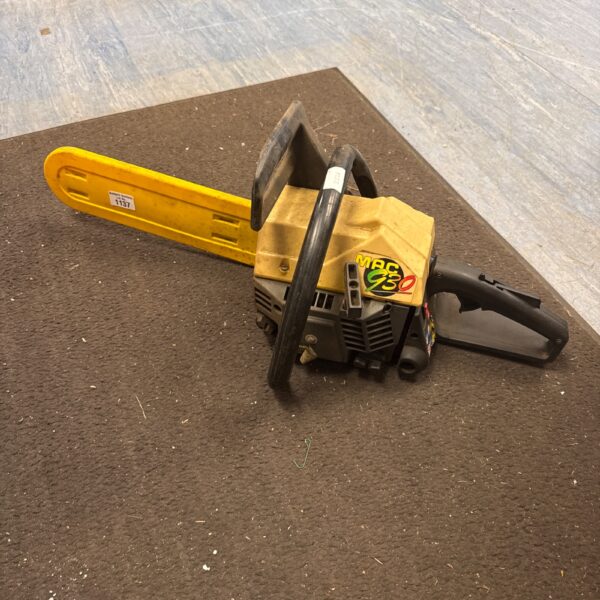 Vintage McCulloch Mac 930 petrol chainsaw for garden and DIY use.