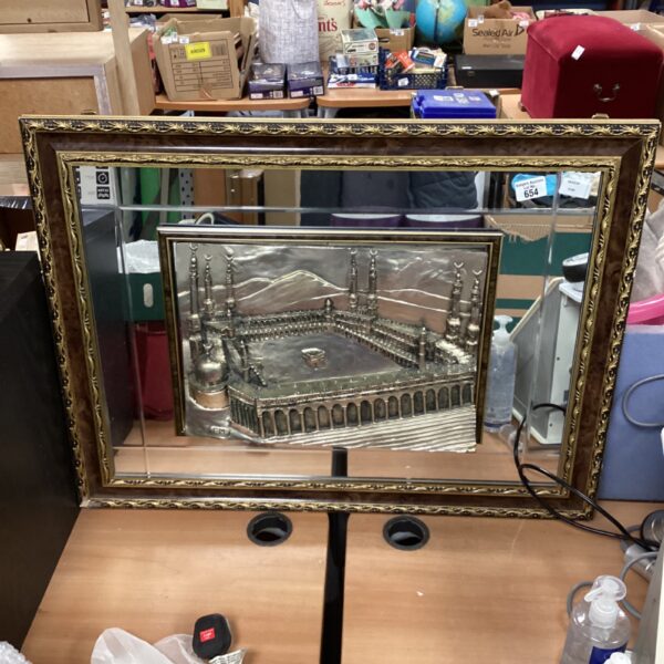 Large Mecca framed mirror with detailed metalwork.