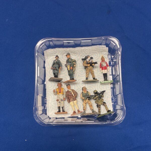Lot of eight detailed metal soldier figures for collectors.