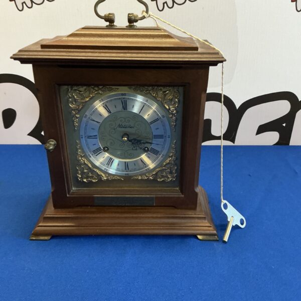 Vintage Metamec mantle clock with wooden case and dial.