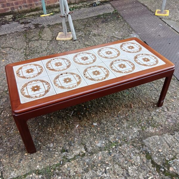 Vintage mid-century coffee table with colourful tile inlay.