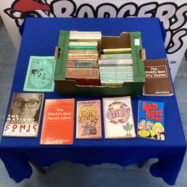 Mixed book lot including joke books and novels.