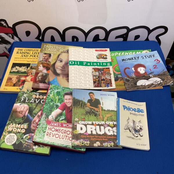 Mixed book lot featuring various paperback titles.
