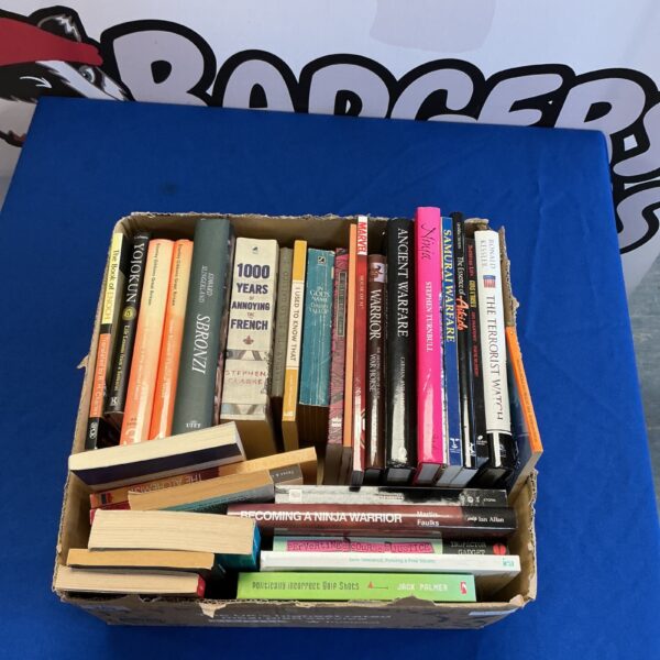 Mixed book lot including Stephen Clarke's "1000 Years of Annoying the French".