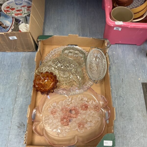 Vintage mixed glassware tray with decorative pressed glass dishes.