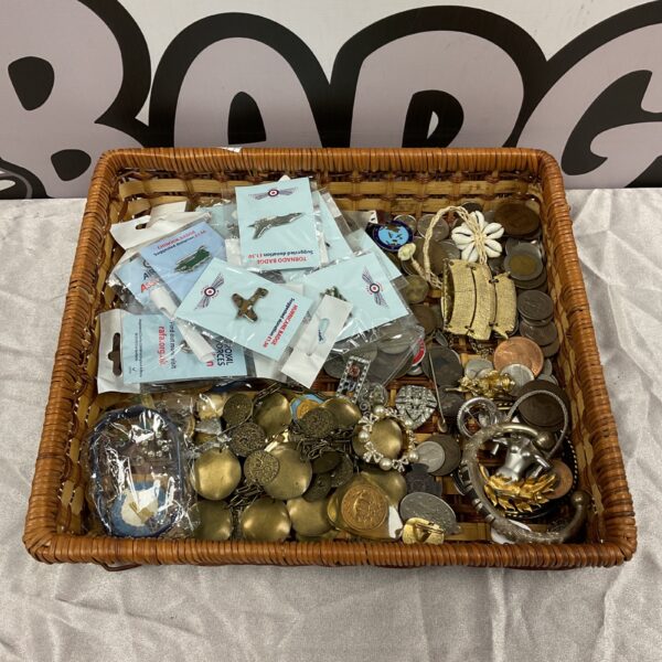 Mixed jewellery, coins, and RAF pin badges in a collectible lot.