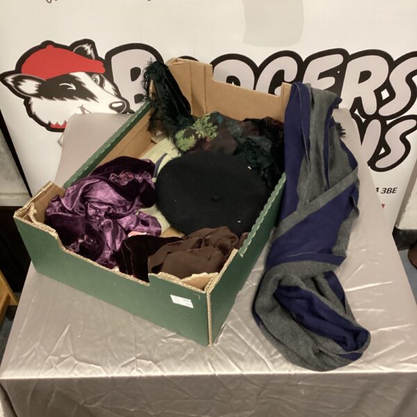 Mixed lot of colourful scarves and hats for winter.