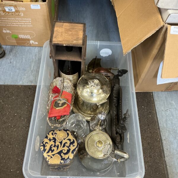 Vintage mixed metalware lot with teapots and brass ornaments.