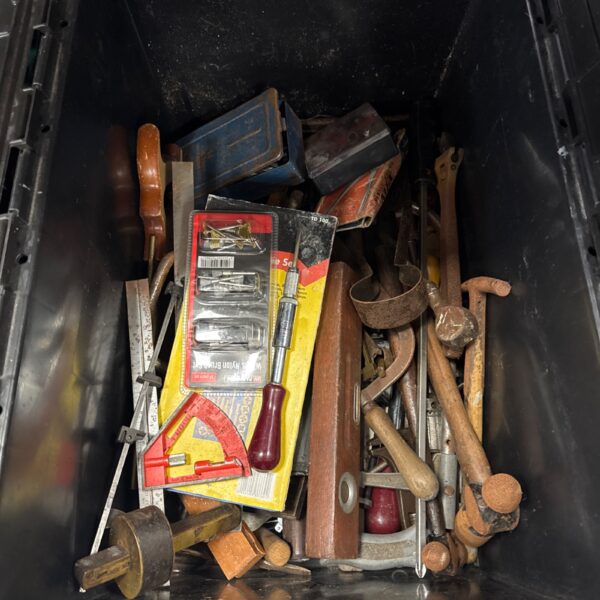 Mixed lot of vintage hand tools in a crate.