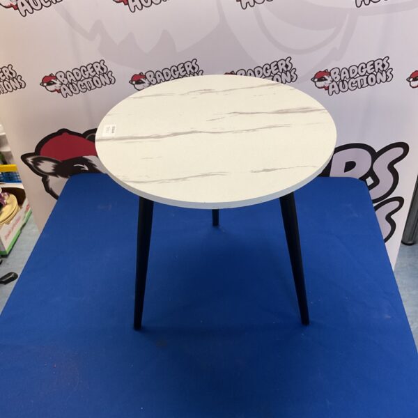 Modern side table with marble effect top and three legs.