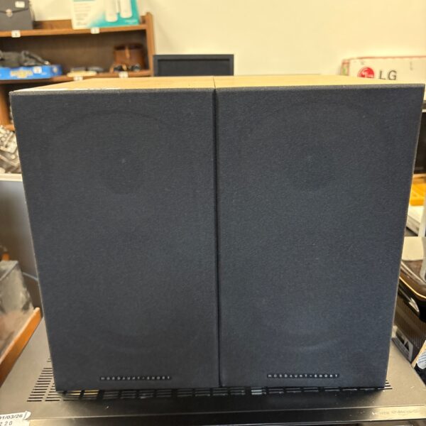 Pair of Mordaunt Short Avant 902i bookshelf speakers in a home setting.