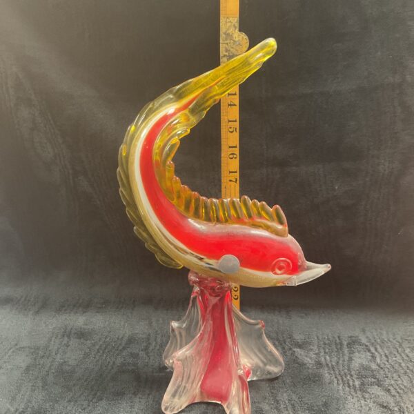 Vibrant Murano glass fish sculpture with yellow fins.