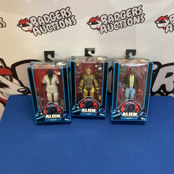 Neca Alien figures Kane, Parker, and Brett in packaging.