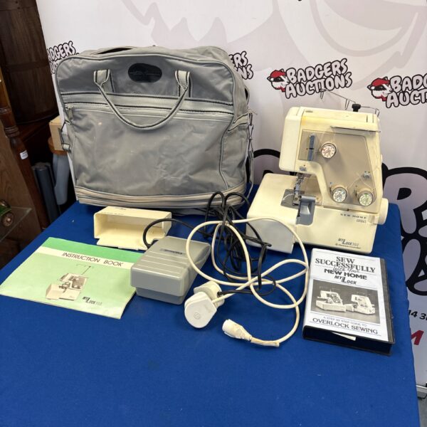Vintage New Home My Lock 203 overlock sewing machine for sale.