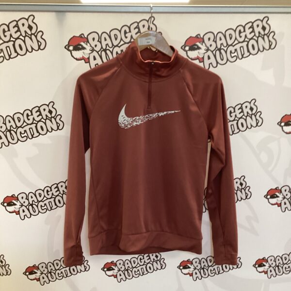 Pink Nike running top, athletic wear for women.