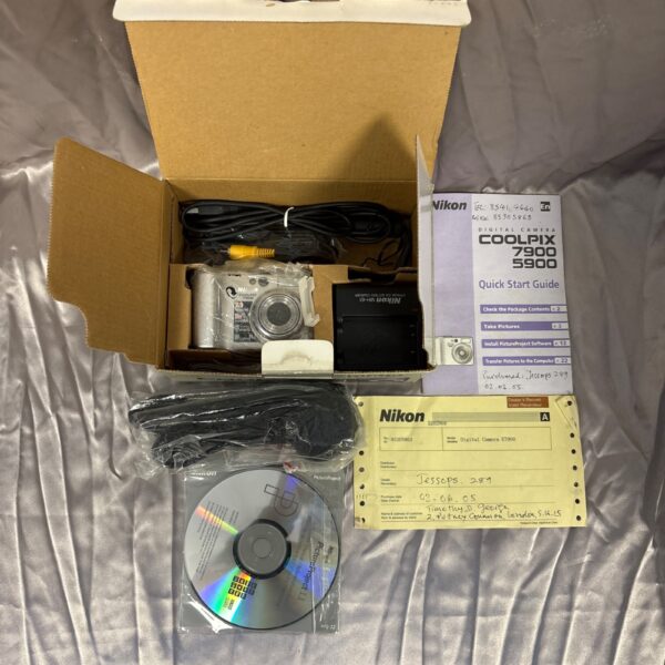 Nikon Coolpix 7900 digital camera with original box and accessories.