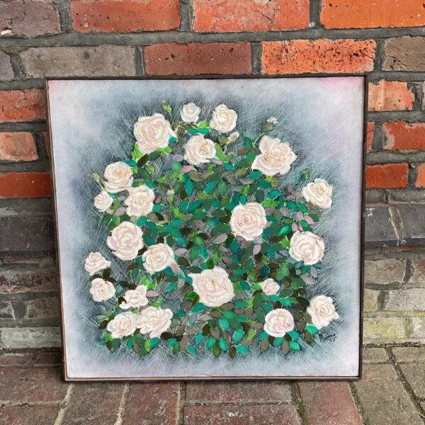 Signed oil painting of a vibrant display of roses, floral still life.
