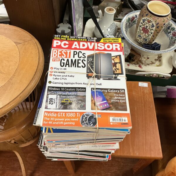 Large lot of PC Advisor magazines for computing enthusiasts.