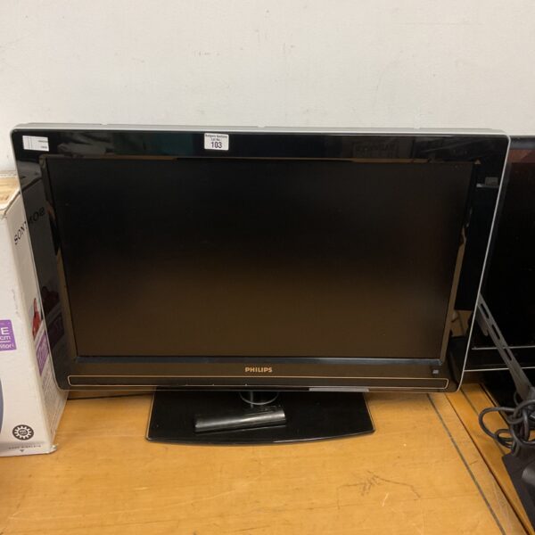 Front view of a black Philips 32 inch flat screen TV.