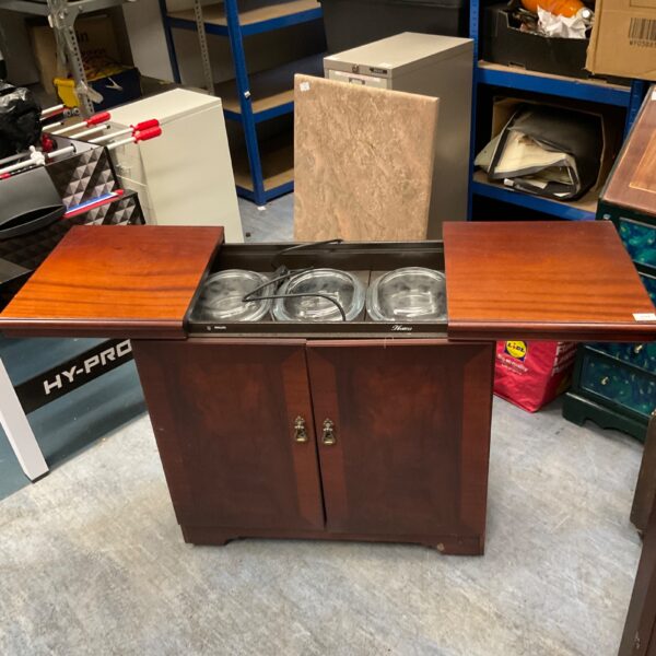 Vintage Philips hostess trolley with multiple tiers for serving.