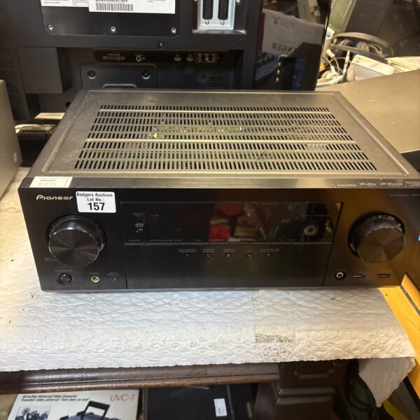 Black Pioneer VSX-923 AV receiver for home cinema setup.