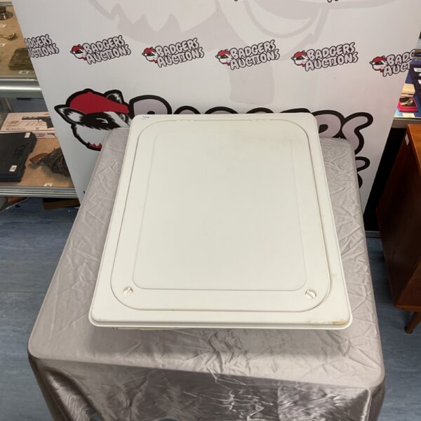White plastic loft hatch panel for attic access.